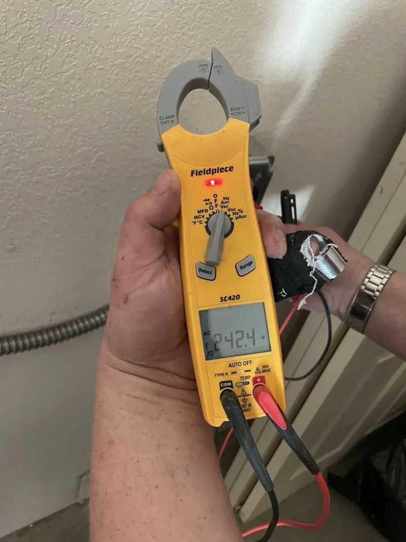 Voltage testing with clamp meter during Generator Installation in Ashburn